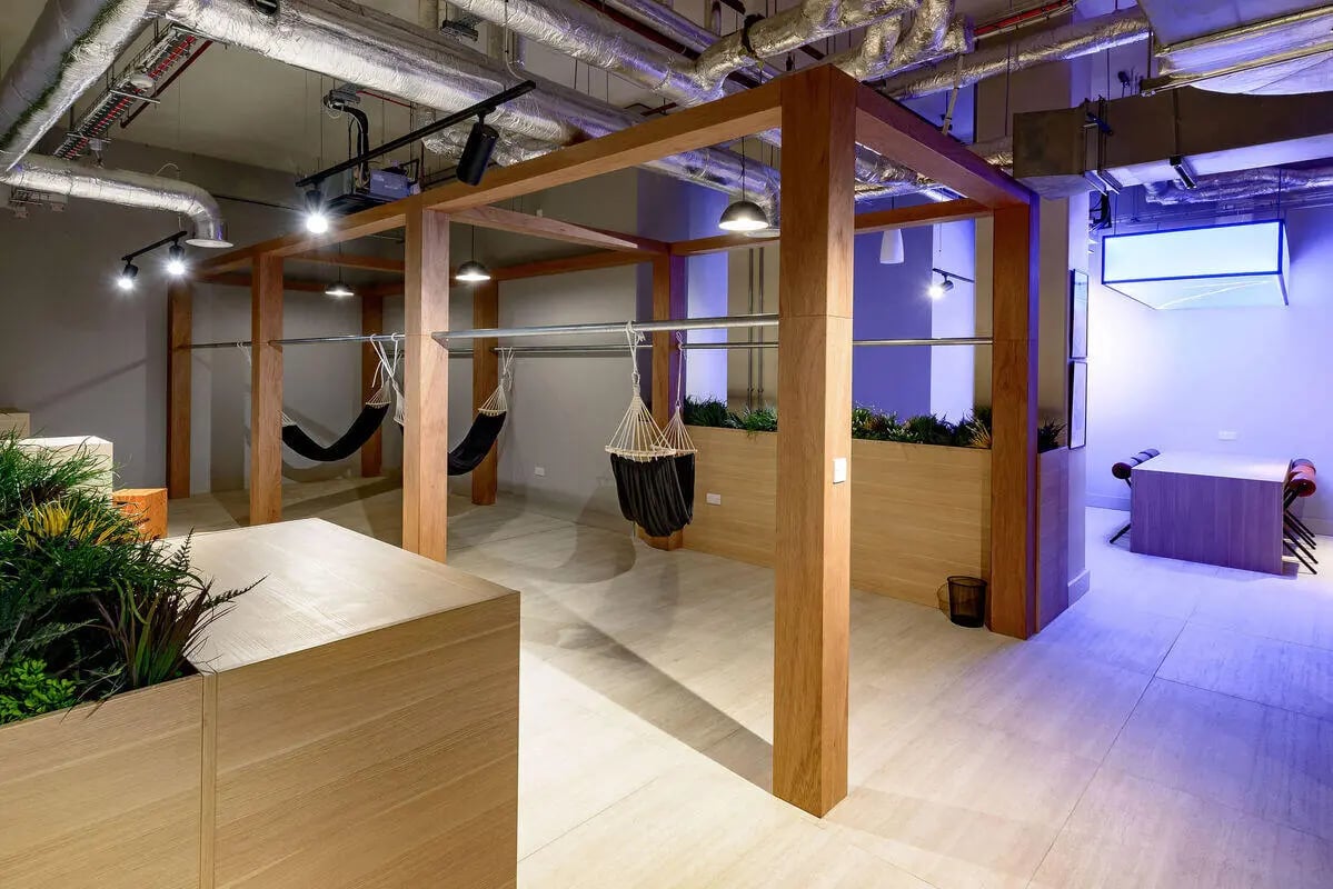 Hammocks in wooden frame lounge area at True Nottingham in Nottingham Student Accommodation