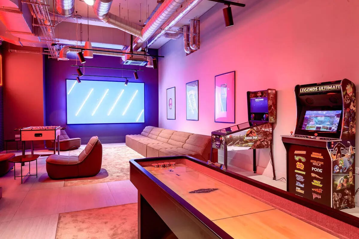 Shuffleboard foosball arcade games couch living room at True Nottingham in Nottingham Student Accommodation