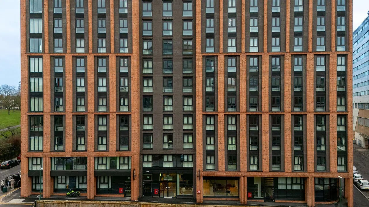 Student accommodation exterior with many windows and brick facade at True Nottingham in Nottingham Student Accommodation