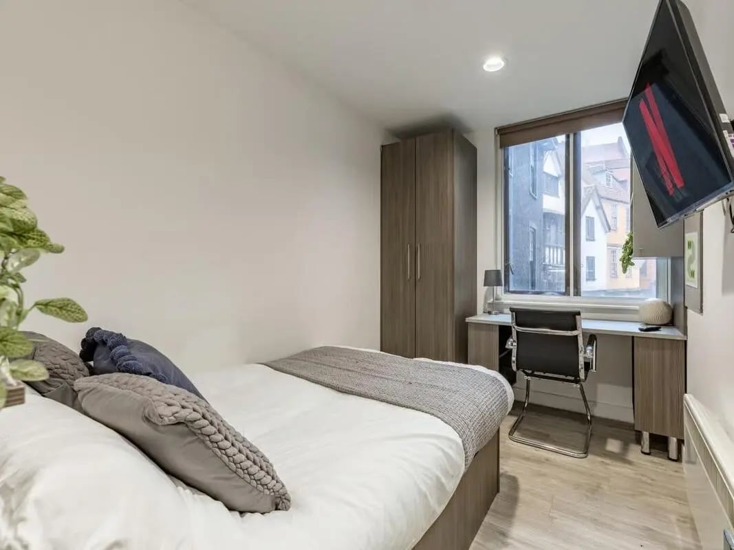 Bed wardrobe desk chair study bedroom at Centre Gate in Bristol Student Accommodation