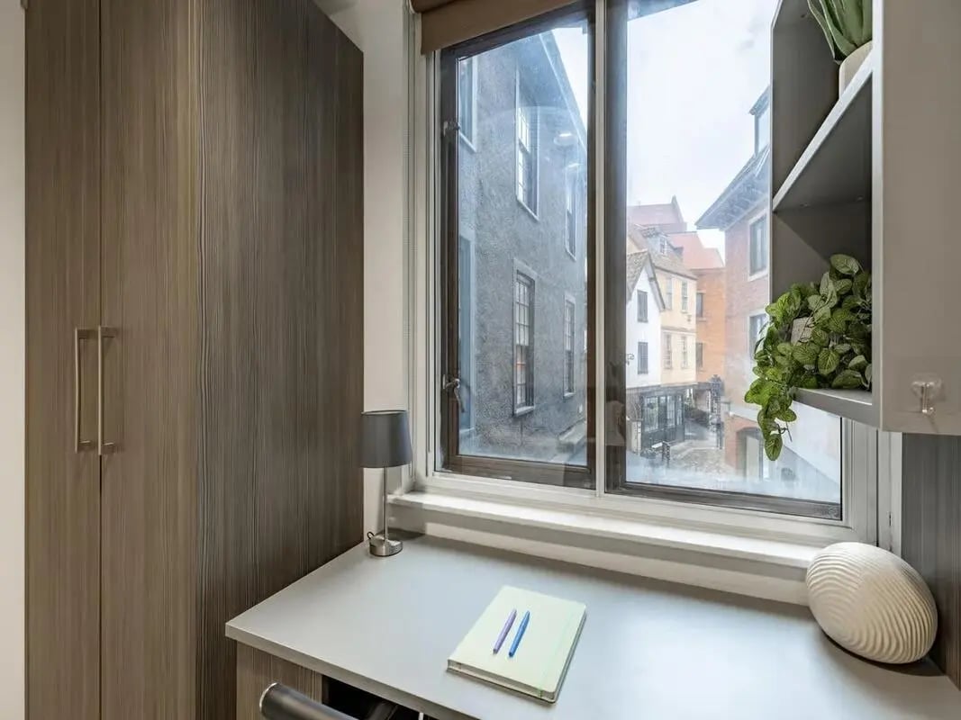 Wardrobe desk lamp and notebook study area at Centre Gate in Bristol Student Accommodation