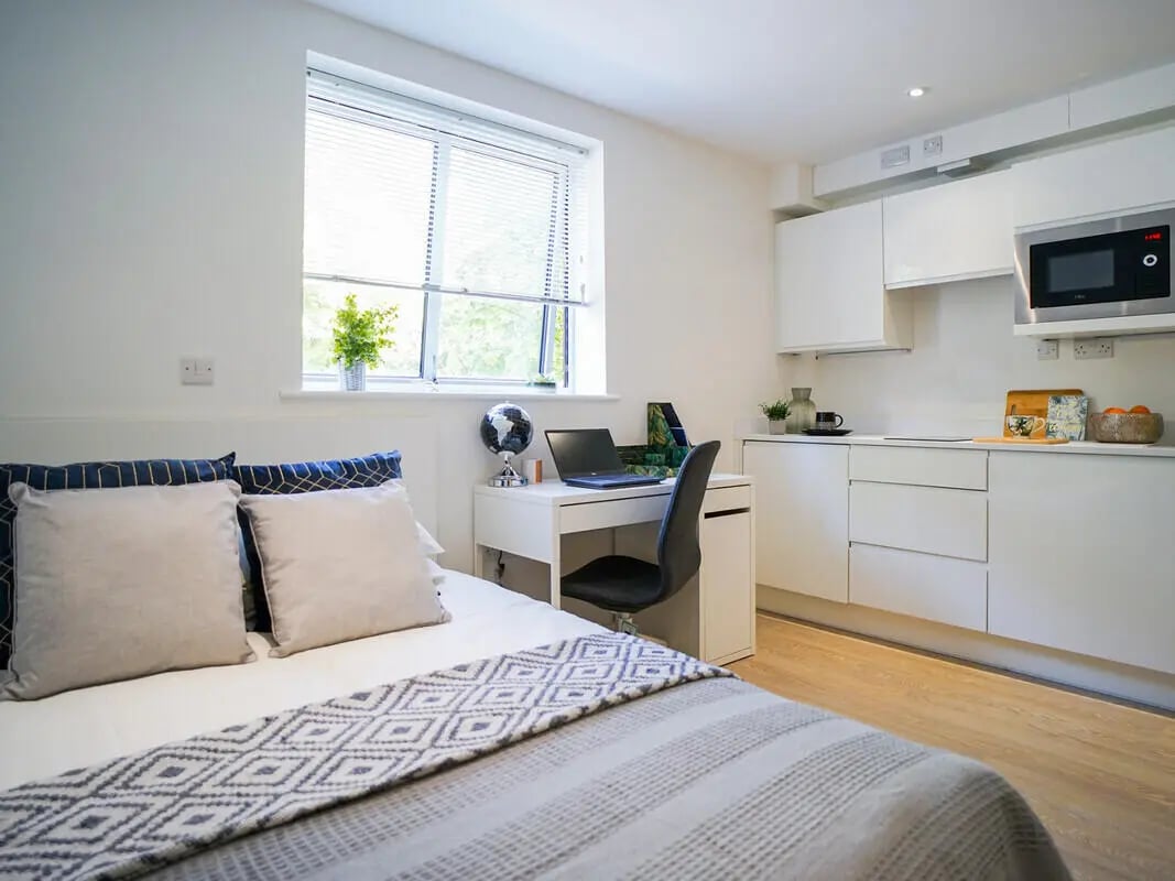 Bed desk and kitchen unit with microwave bedroom studio at Orme House in Newcastle Under Lyme Student Accommodation