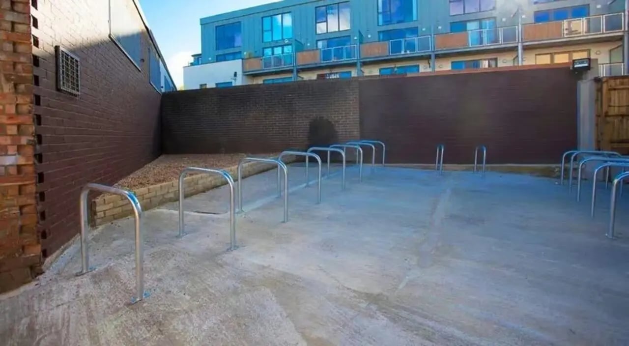 Bike racks in courtyard exterior at The Cube Greenwich in London Student Accommodation
