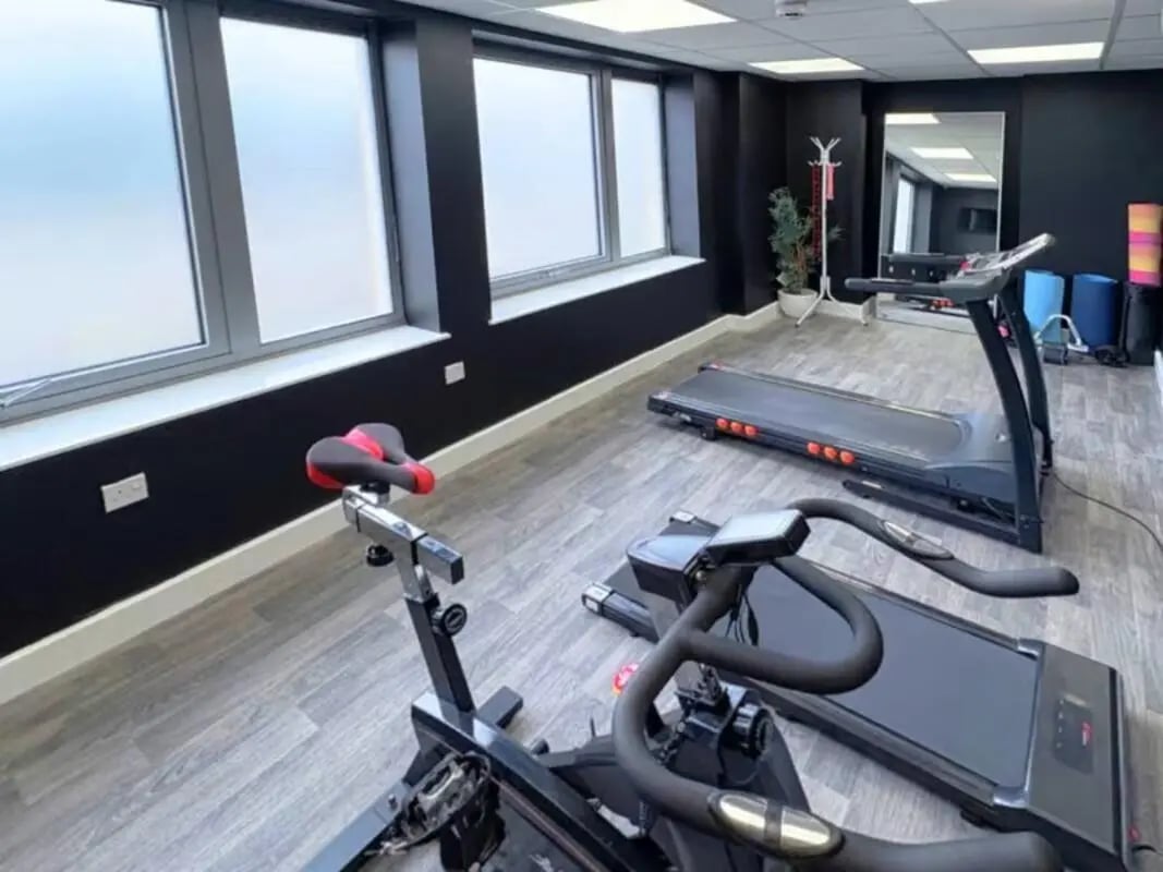 Spin bike and treadmills in gym at The Cube Greenwich in London Student Accommodation