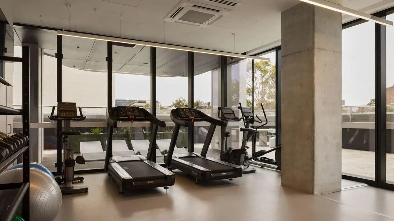 Treadmills exercise bikes and weights gym area at UniLodge Perth Central in Perth Student Accommodation