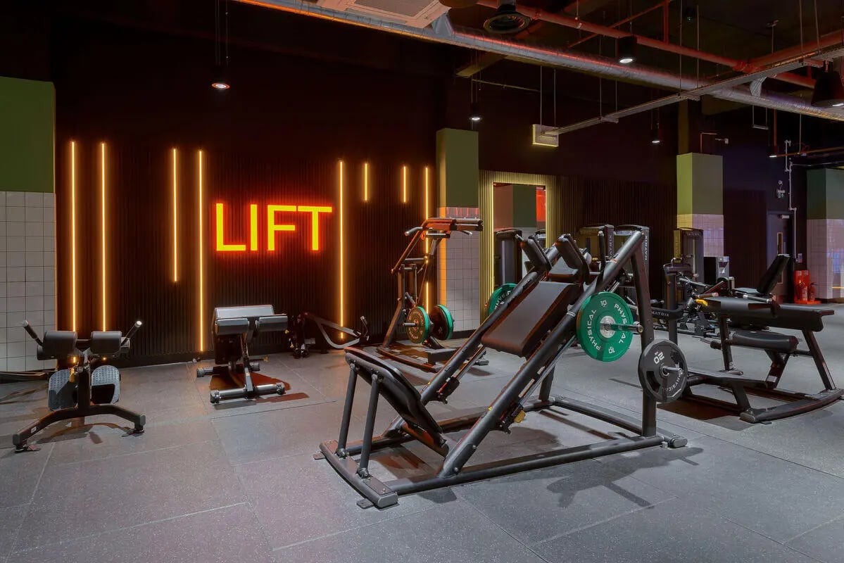 Gym equipment with LIFT neon sign Gym at True Leicester in Leicester Student Accommodation