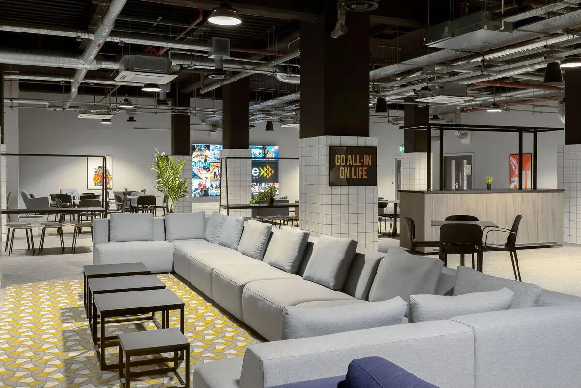 Large sectional sofa coffee tables study area at True Leicester in Leicester Student Accommodation