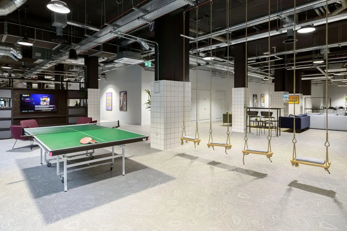Ping pong table swings and lounge area common area at True Leicester in Leicester Student Accommodation