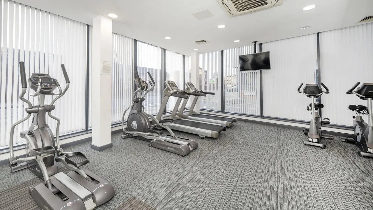 Elliptical treadmills stationary bikes exercise room at Glassworks - Liverpool in Liverpool Student Accommodation