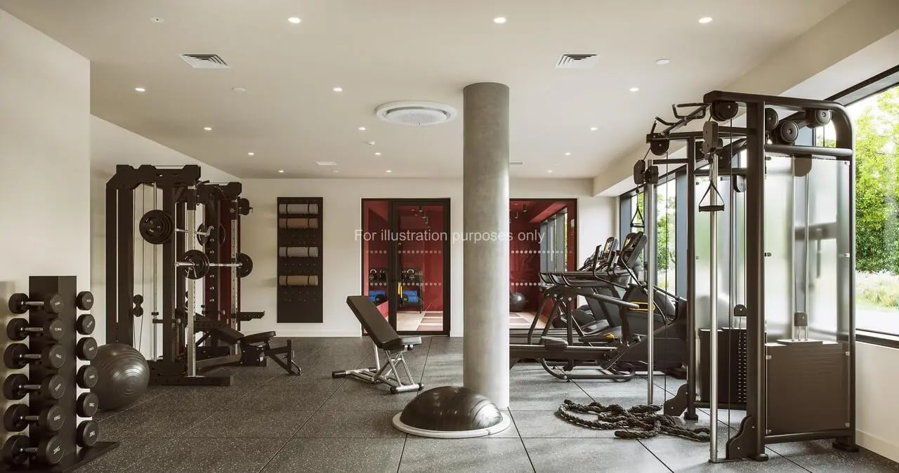 Dumbbells weight machines treadmills yoga mats gym area at Press House in London Student Accommodation