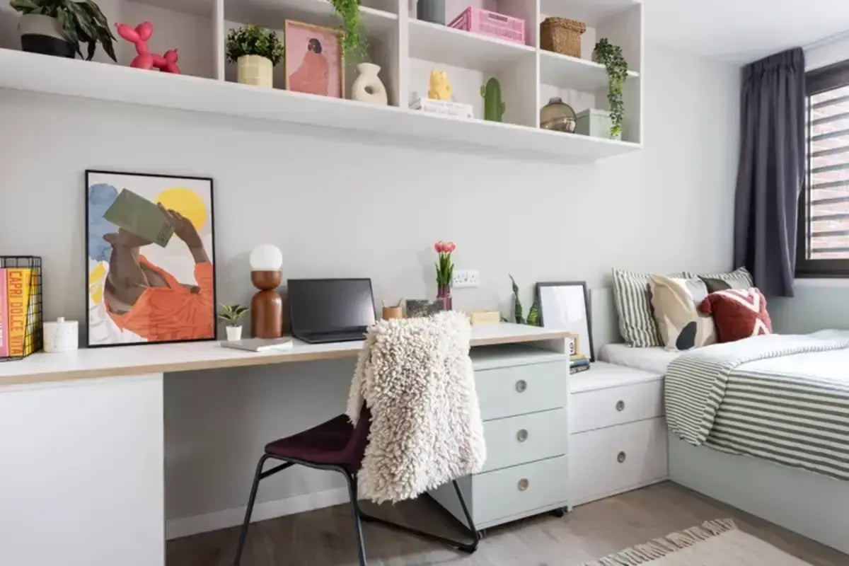 Desk laptop chair bed with pillows and bedding Bedroom at Hawthorne House in London Student Accommodation