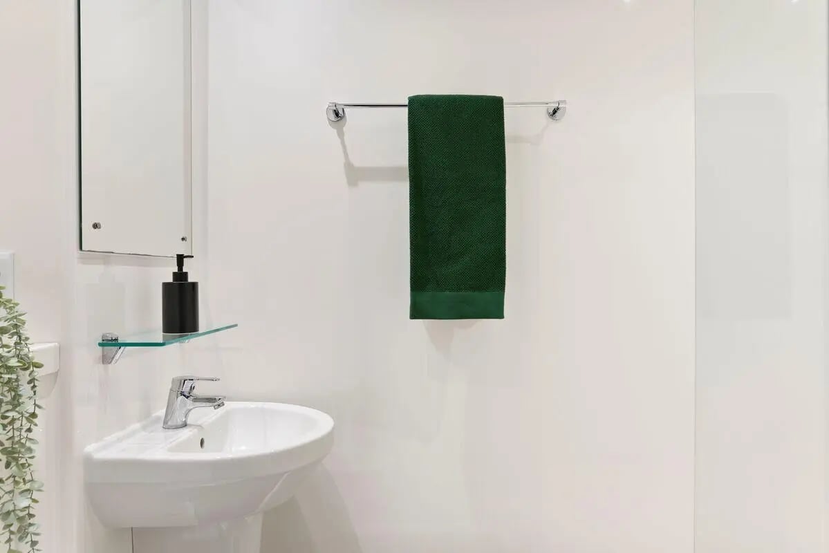 Sink soap dispenser towel rack bathroom at Westwood Student Mews in Coventry Student Accommodation