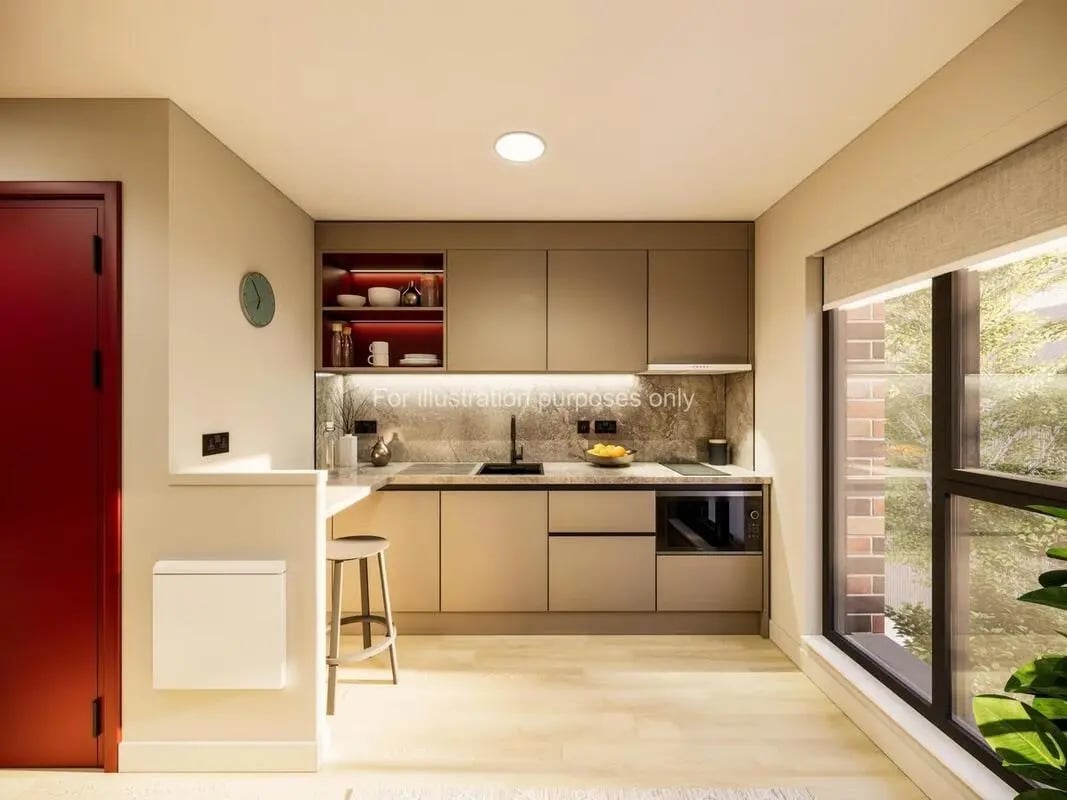 Modern kitchen with sleek cabinets and breakfast bar kitchen at Swan Residences in Glasgow Student Accommodation