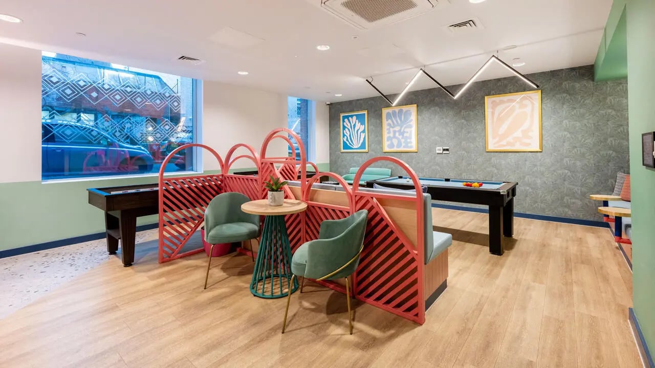 Pool table seating area and artwork common room at Wick Park in London Student Accommodation