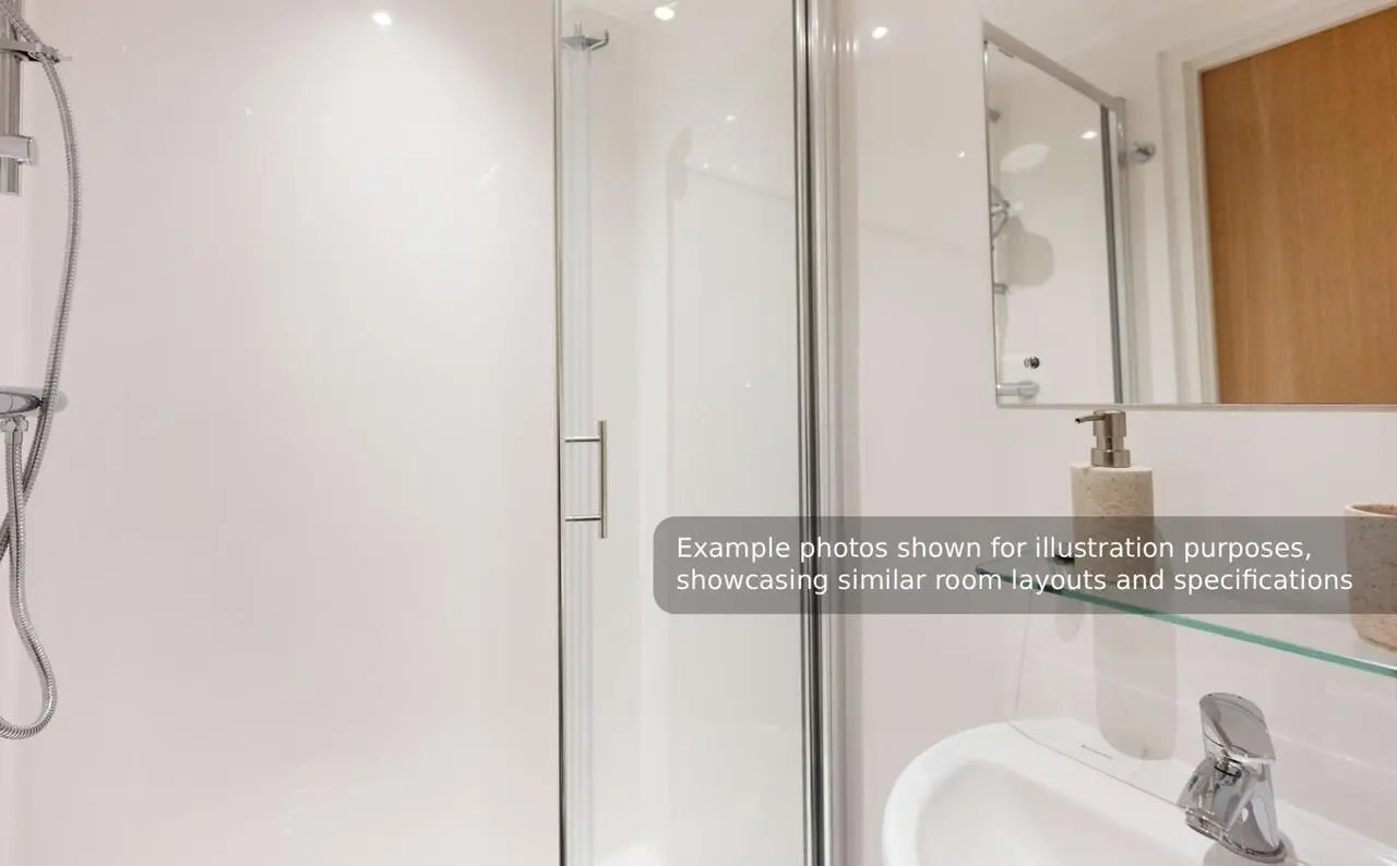 Shower stall sink soap dispenser and mirror bathroom at Straits Mile in Edinburgh Student Accommodation