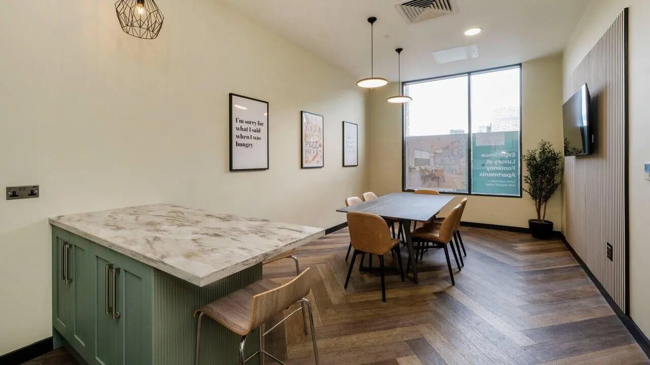 Kitchen island dining table and chairs living room at Fontenoy Apartments in Liverpool Student Accommodation