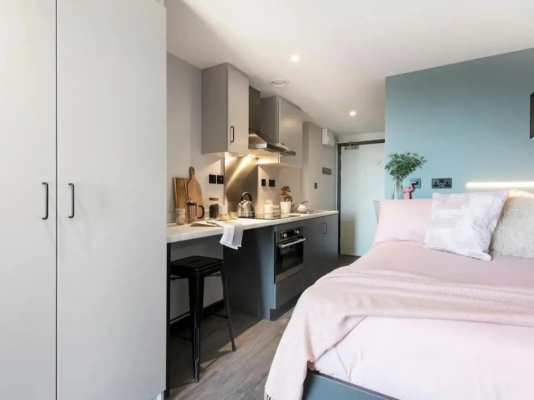 Modern studio with bed kitchen and wardrobe studio apartment at Zenith in Cardiff Student Accommodation
