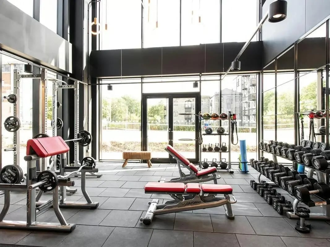 Weight racks benches and dumbbells gym area at Zenith in Cardiff Student Accommodation