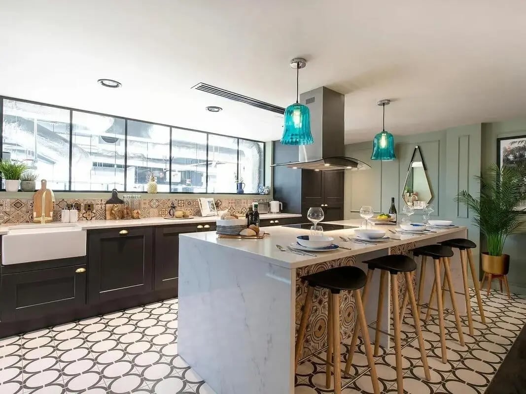Modern kitchen with island and stools kitchen at Zenith in Cardiff Student Accommodation