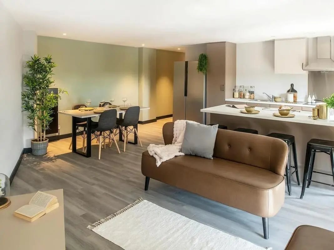 Sofa dining set kitchen appliances living room at Zenith in Cardiff Student Accommodation