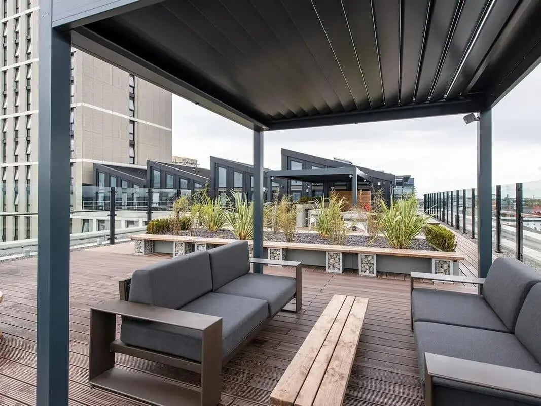 Sofa bench planters and building exterior photo at Zenith in Cardiff Student Accommodation