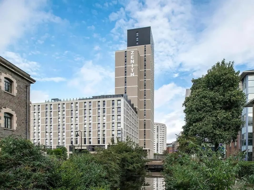 Tall apartment building with Zenith sign exterior at Zenith in Cardiff Student Accommodation