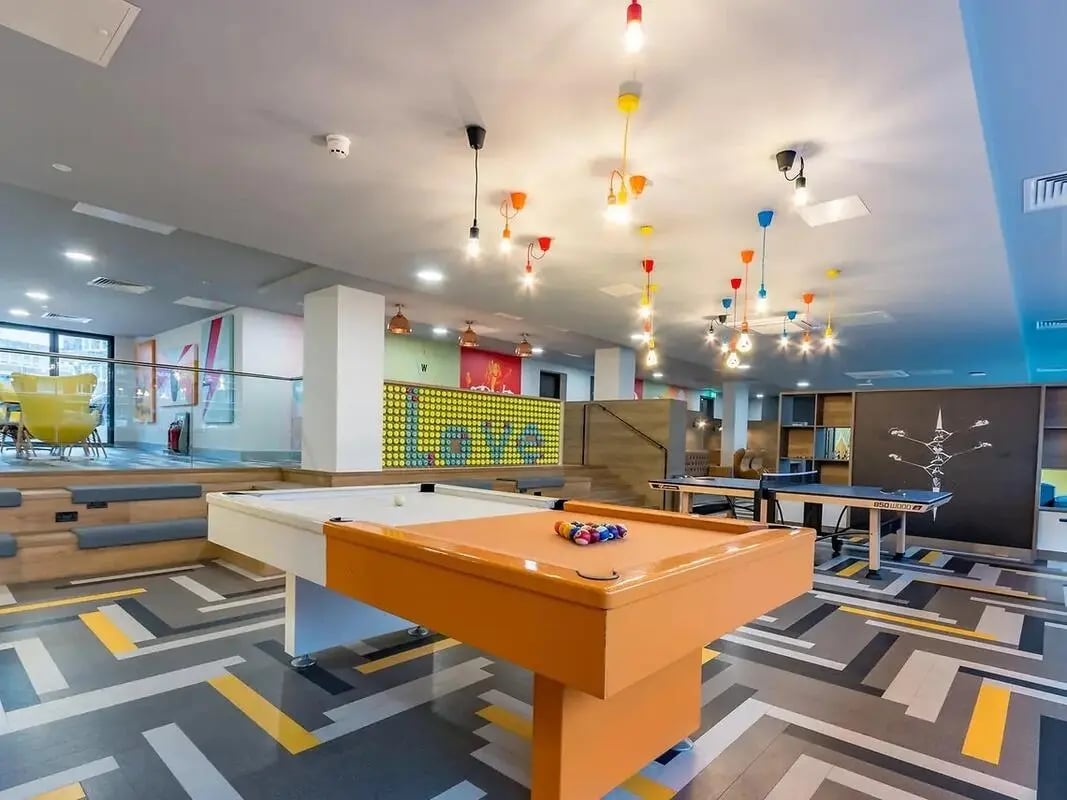 Pool table ping pong tables lounge area recreation room at ViBe Student Living in Kingston Upon Thames Student Accommodation