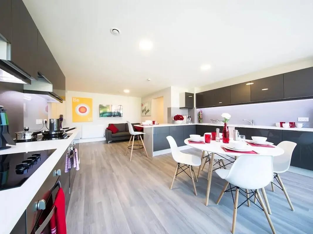 Kitchen dining area with table and chairs living room at ViBe Student Living in Kingston Upon Thames Student Accommodation