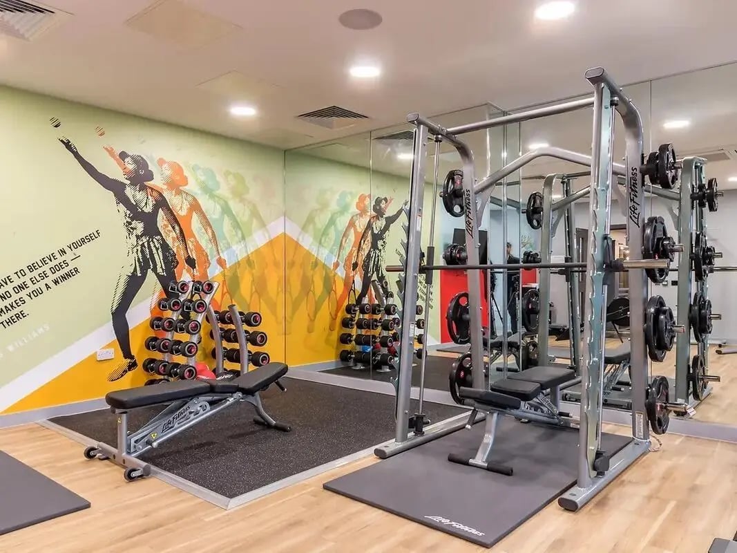 Dumbbells weights bench and mirror gym at ViBe Student Living in Kingston Upon Thames Student Accommodation