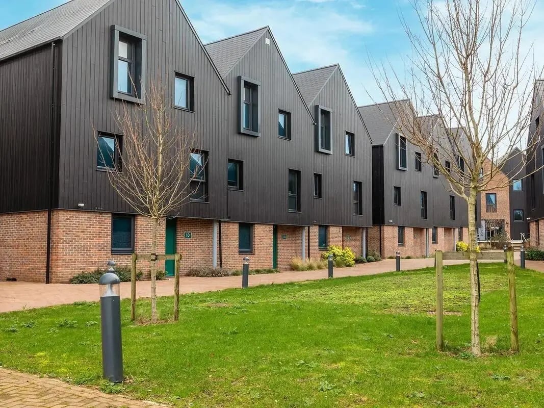 Modern dark timber and brick student accommodation exterior at Elmstead Place in Colchester Student Accommodation