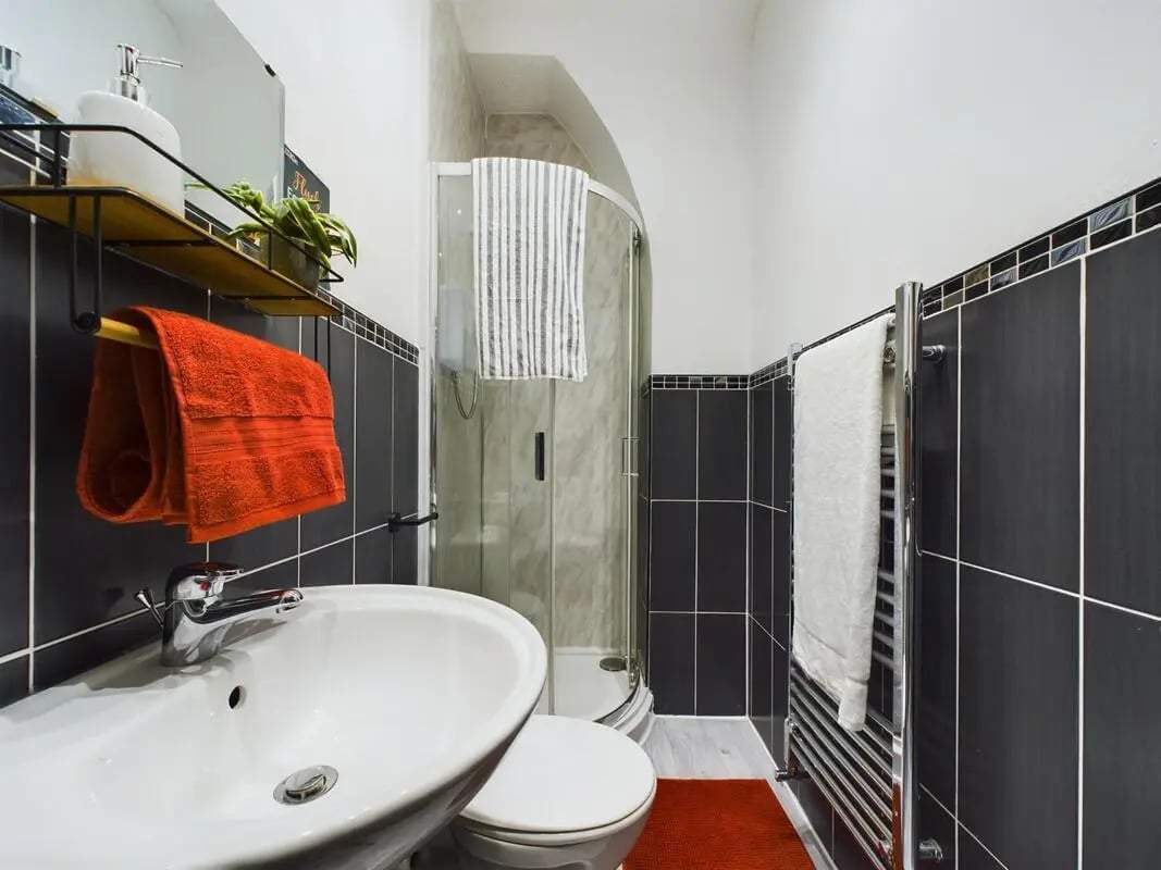 Sink toilet shower chrome towel rack bathroom at 4 Bedroom House at 102, Leopold Road in Liverpool Student Accommodation