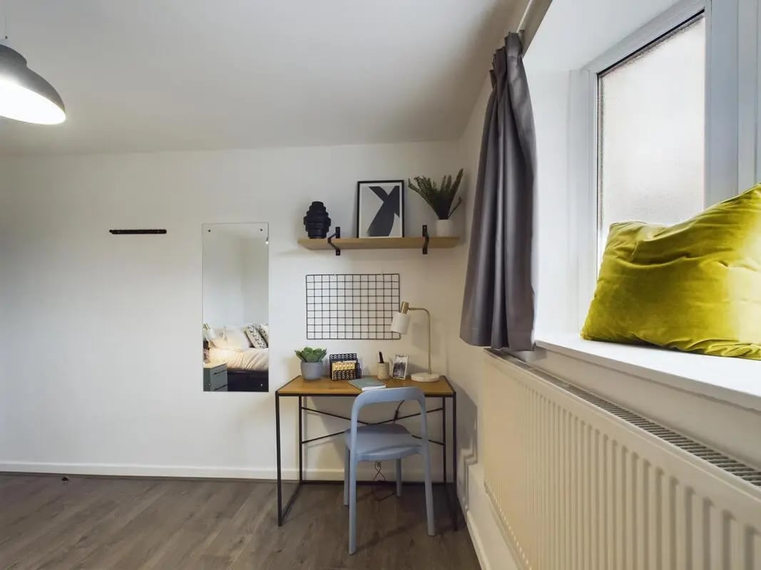 Desk chair mirror and shelf study area at 6 Bedroom House at 2, Flat 2, Windsor House, Clint Road West in Liverpool Student Accommodation