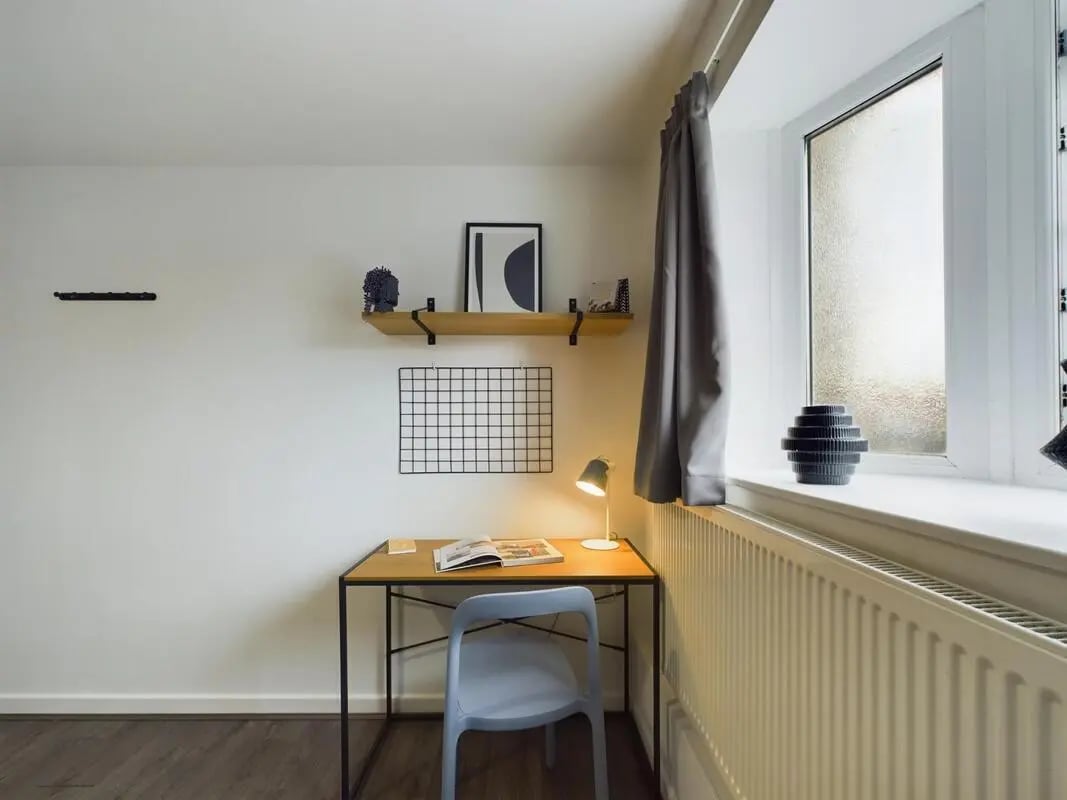 Desk chair lamp and shelf study area at 6 Bedroom House at 2, Flat 2, Windsor House, Clint Road West in Liverpool Student Accommodation
