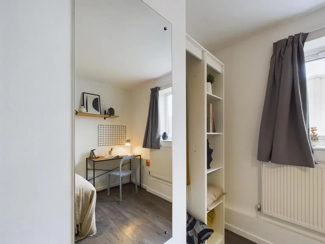 Desk chair lamp grid shelf artwork bed bedroom at 6 Bedroom House at 2, Flat 2, Windsor House, Clint Road West in Liverpool Student Accommodation