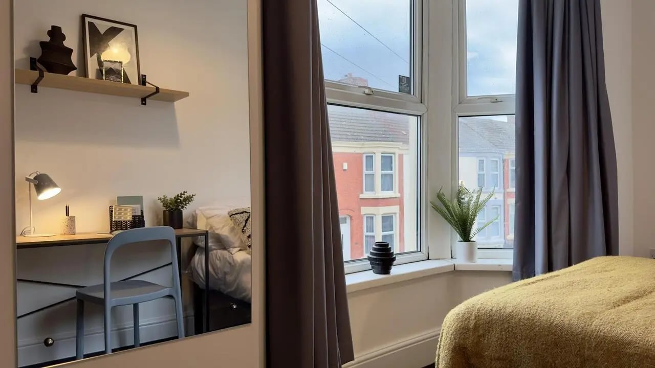 Desk chair lamp shelf picture mirror bedroom at 4 Bedroom House at 126, Empress Road in Liverpool Student Accommodation