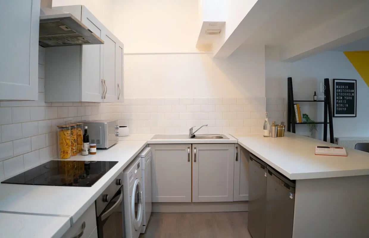 Sink hob dishwasher cabinets microwave kitchen at 6 Bedroom House at 64A, Monson Street in Lincoln Student Accommodation