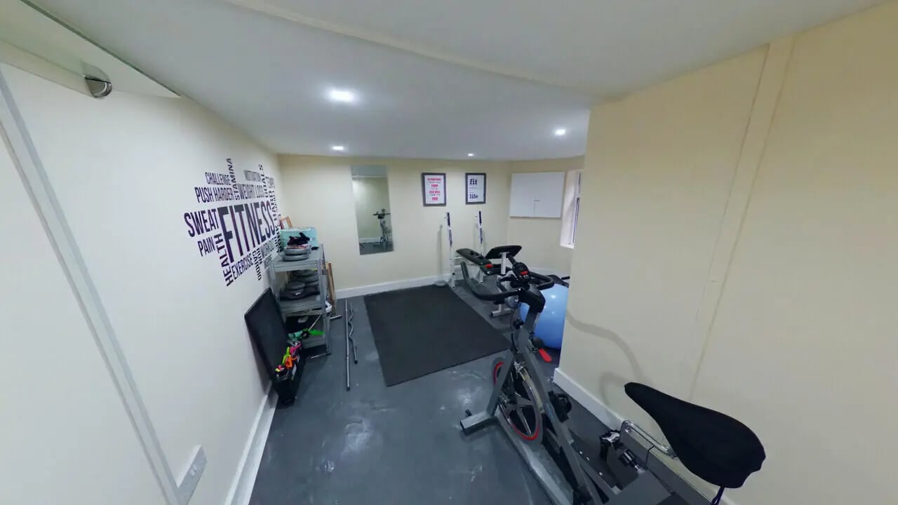 Spin bike weight rack and weights fitness area at 4 Bedroom House at 120, Adelaide Road in Liverpool Student Accommodation