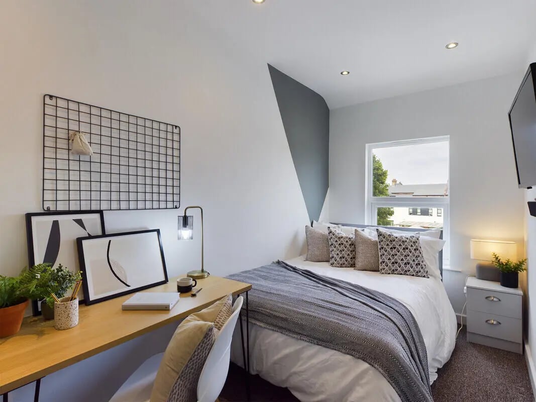 Bed desk framed art and lamp bedroom at 6 Bedroom House at 328, Upper Parliament Street in Liverpool Student Accommodation