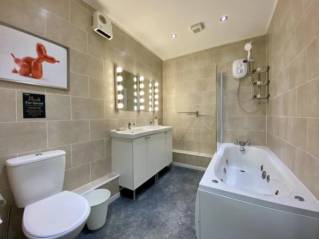 Toilet sink bathtub and mirror bathroom at 2 Bedroom House at Flat 2, 36, CARLTON AVENUE in Manchester Student Accommodation