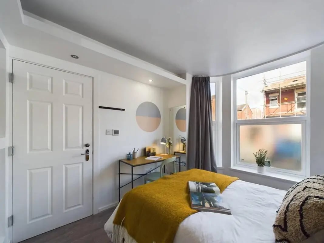Bed desk and white door Bedroom at 5 Bedroom House at 2, Crofton Street in Manchester Student Accommodation