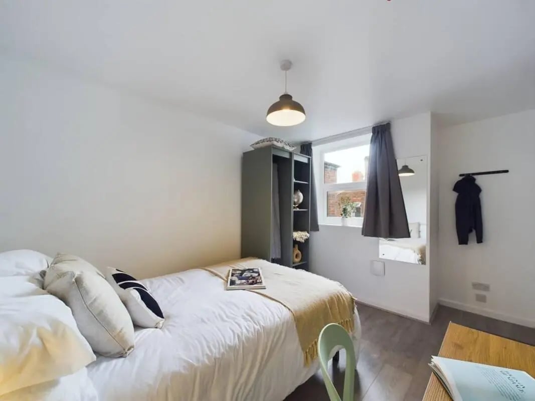 Bed wardrobe and desk bedroom at 5 Bedroom House at 2, Crofton Street in Manchester Student Accommodation