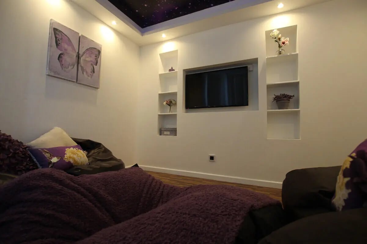 Beanbags TV and butterfly art living room at 6 Bedroom House at 49, Ruskin Avenue in Manchester Student Accommodation