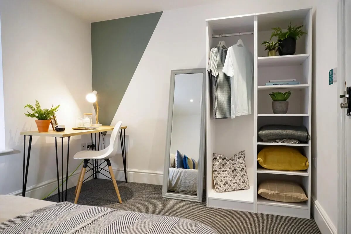 Desk chair mirror wardrobe bedding bedroom at 4 Bedroom House at 24, Studios at, West Parade in Lincoln Student Accommodation
