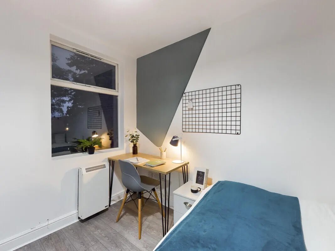 Desk chair lamp and bed bedroom at 6 Bedroom House at 10, Richmond Road in Lincoln Student Accommodation
