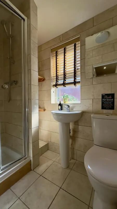 Shower sink toilet with blinds bathroom at 6 Bedroom House at 12, Studios at, Richmond Road in Lincoln Student Accommodation