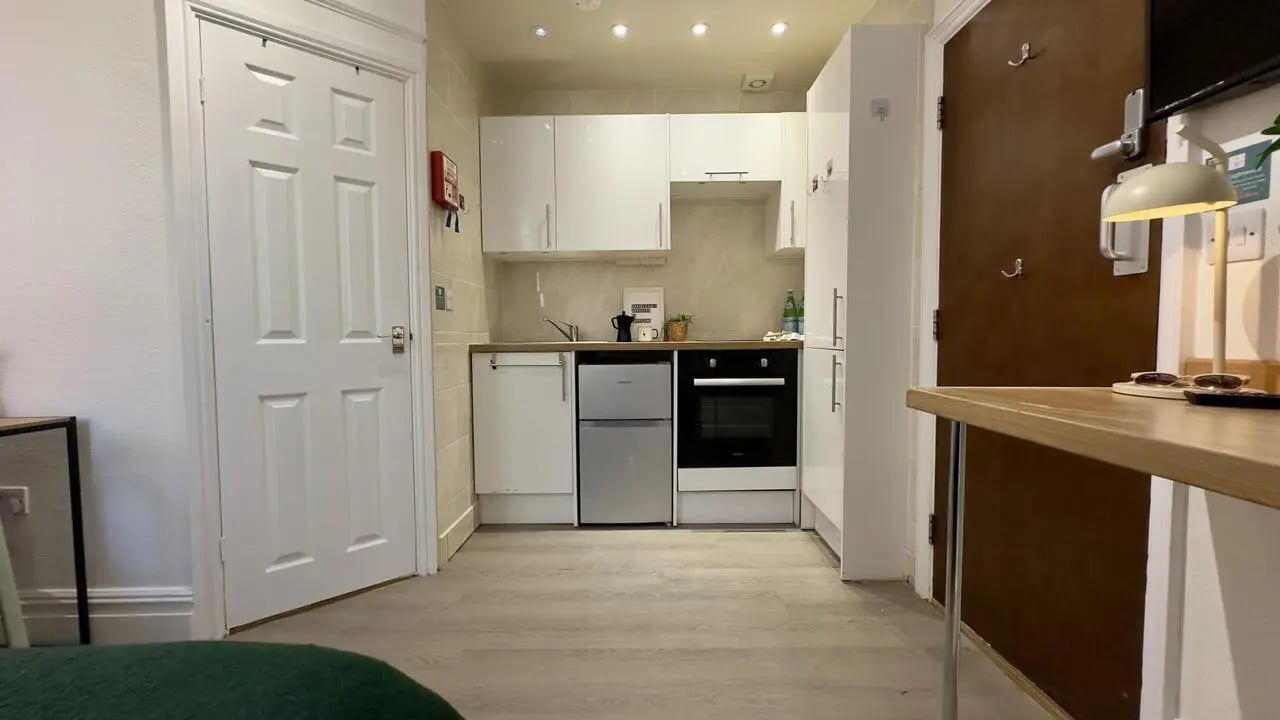 Compact kitchen with oven fridge sink and cupboards kitchen at 6 Bedroom House at 12, Studios at, Richmond Road in Lincoln Student Accommodation