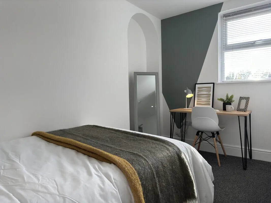 Bed desk chair mirror modern student bedroom at 6 Bedroom House at 43, Monks Road in Lincoln Student Accommodation