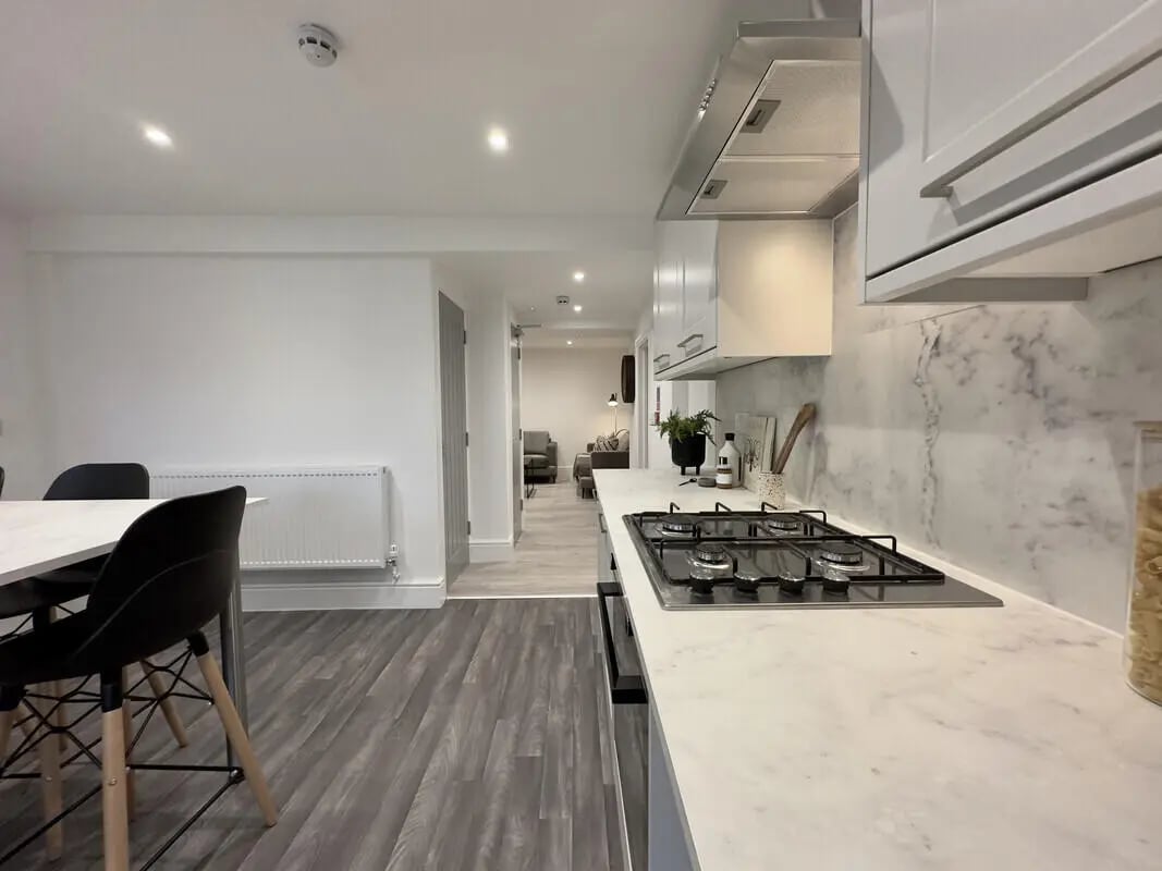 Modern kitchen with dining area living room view kitchen at 6 Bedroom House at 45, Monks Road in Lincoln Student Accommodation