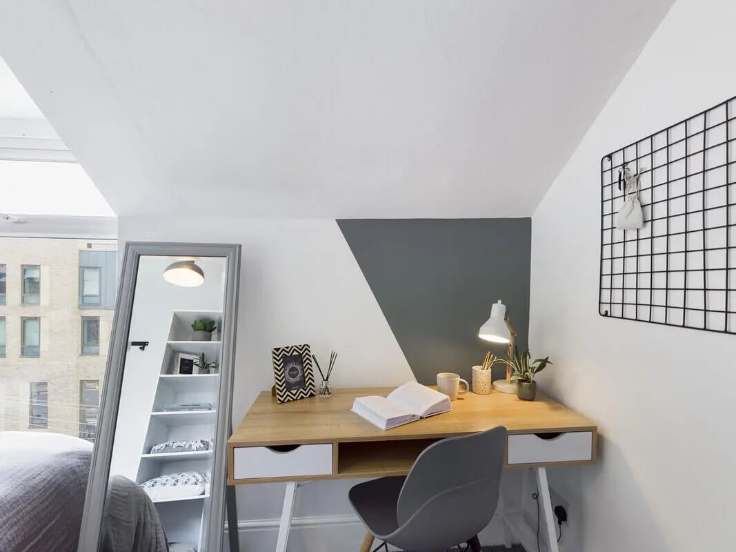 Desk with lamp mirror shelving and chair study area at 6 Bedroom House at 75A, West Parade in Lincoln Student Accommodation