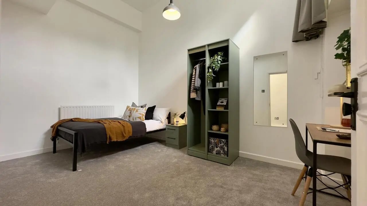 Bed closet nightstand desk mirror bedroom at 6 Bedroom House at 19C, Bower Road in Sheffield Student Accommodation